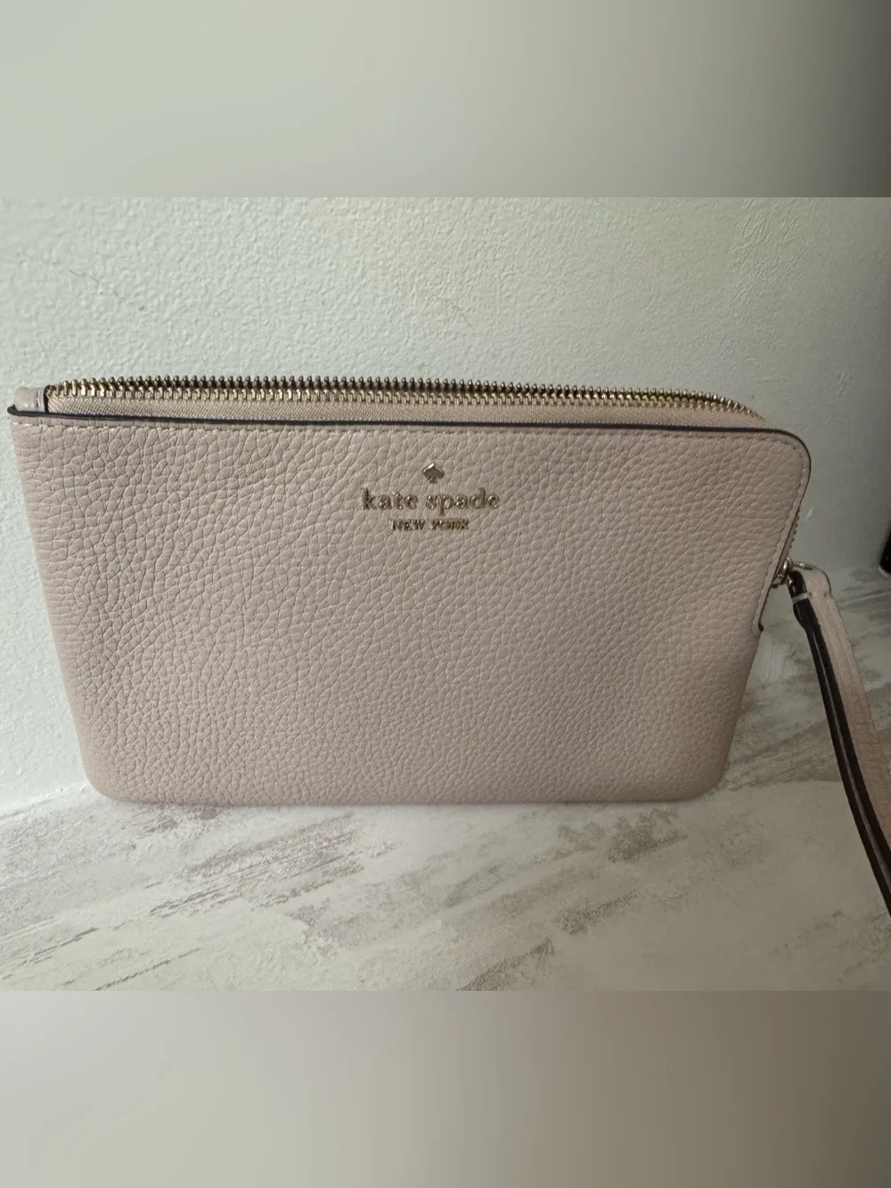 Kate Spade Pebbled Leather Wristlet in Blush Pink